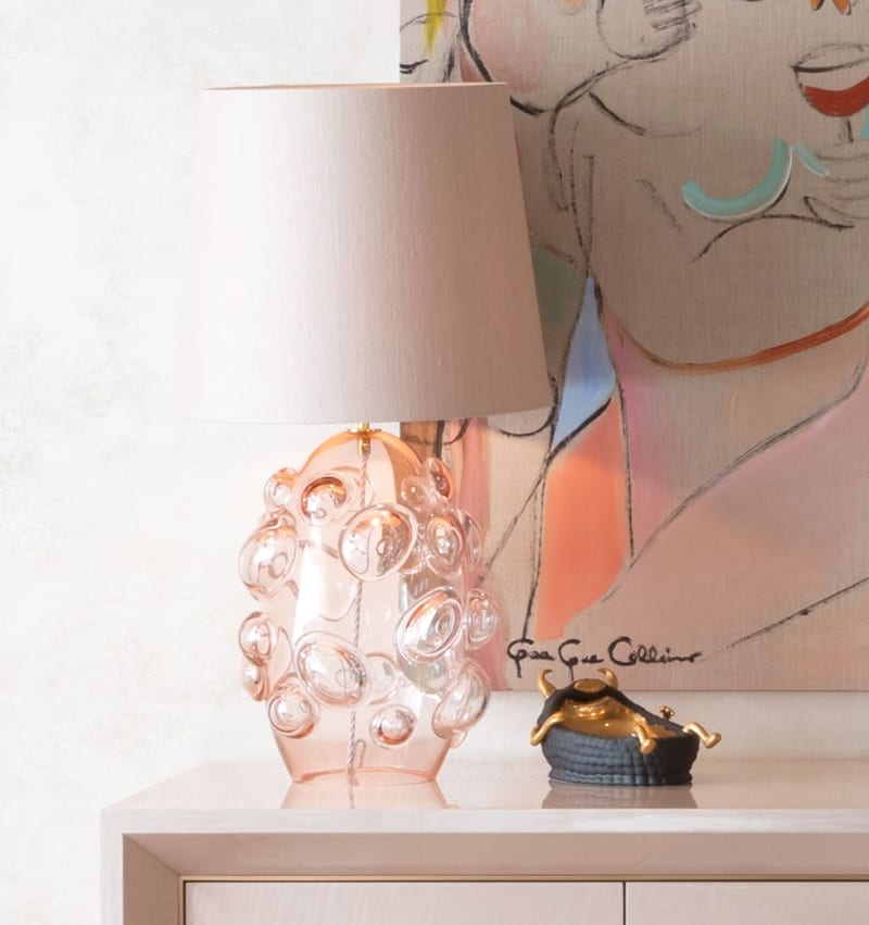 A statement pendant light in a styled room