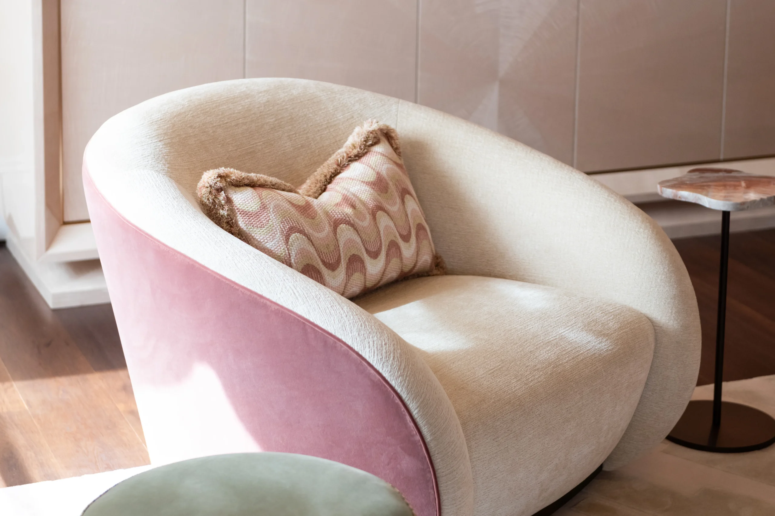 curved swivel armchair